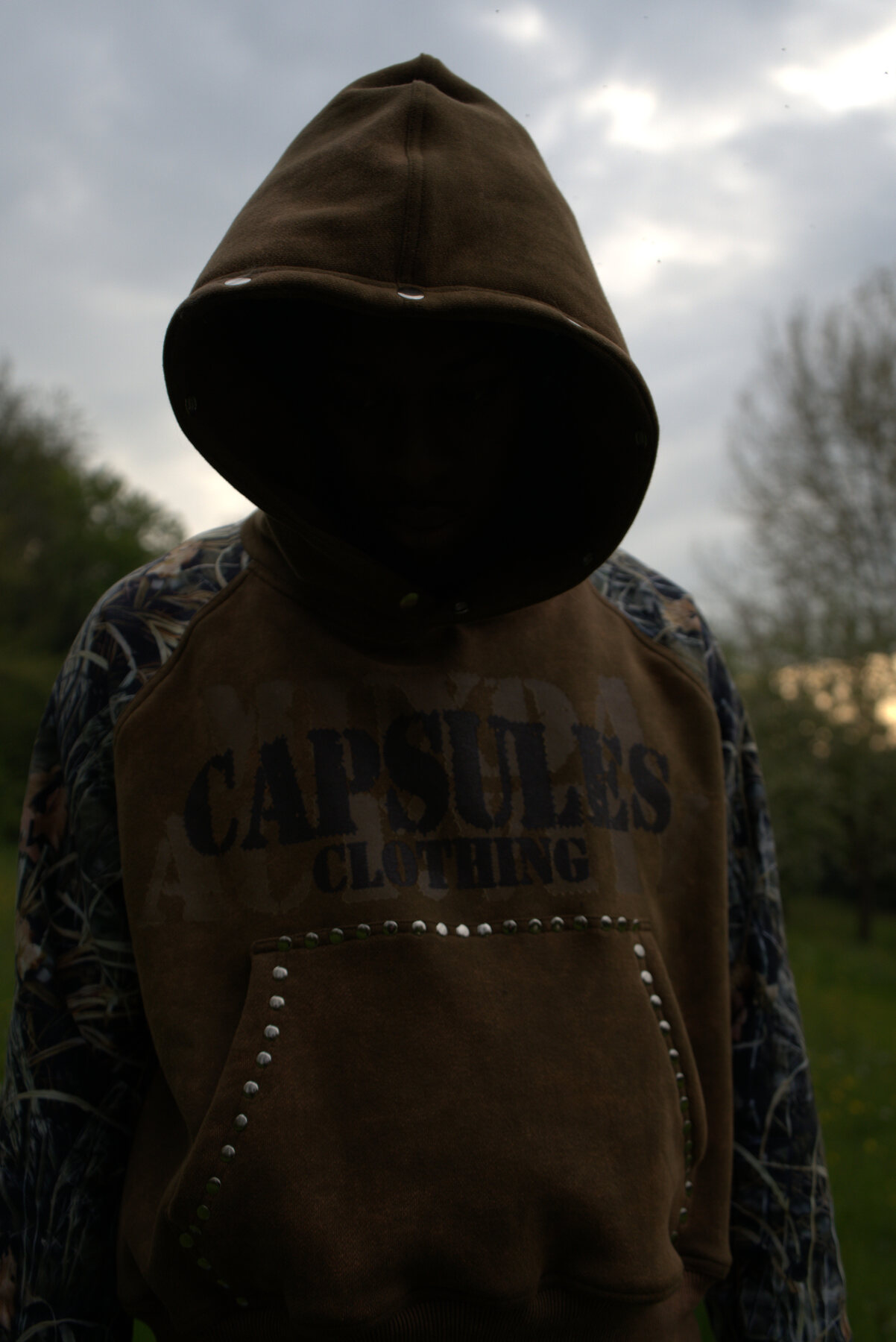 Early CAPSULES hoodie, fur-trimmed hood, front view